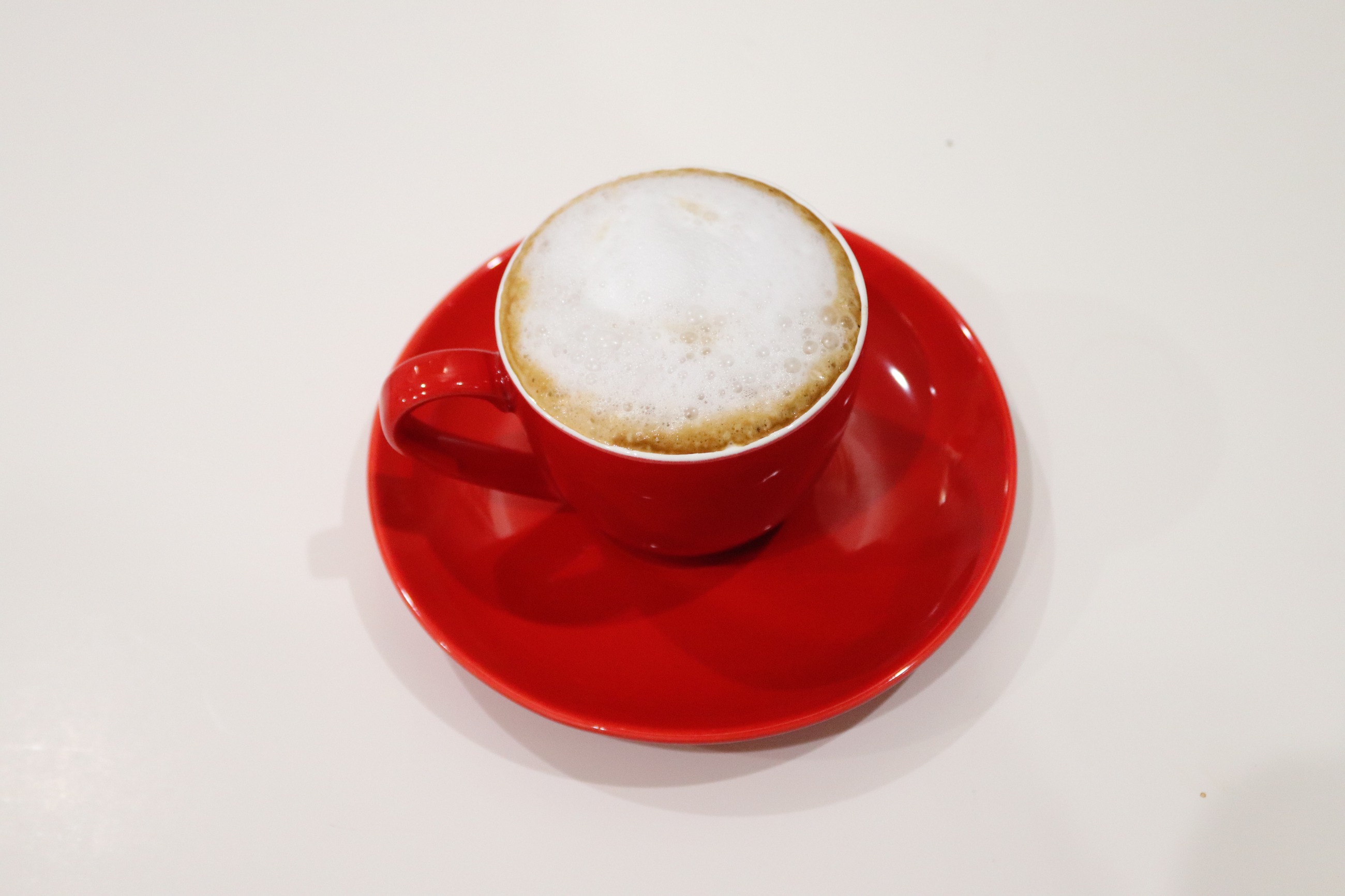 a cup of coffee on a table