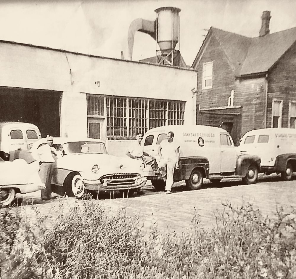Standard Coffee Company delivery trucks outside the Detroit roastery